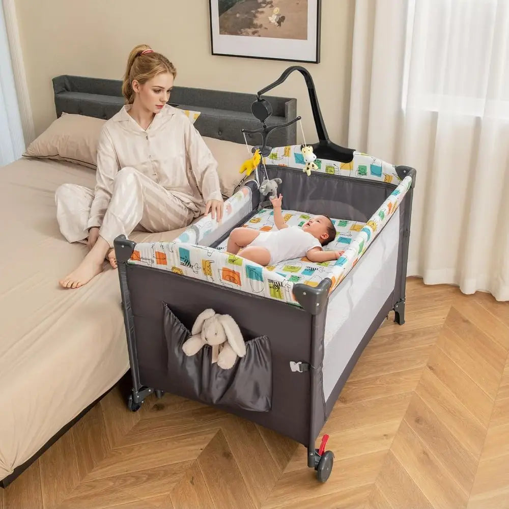 6-in-1 Multifunctional Play Yard with Bassinet, Changing Table, and Storage for Infants (Gray)